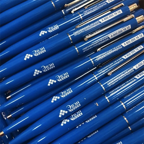 Печать на ручках от Triton с надписью на фото: компания эвен