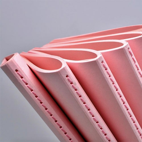 На фото: напечатанные тетради розового цвета от Triton